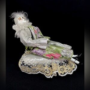 Vintage Musical Harlequin Clown Doll on Pillow that Twirls with Music 11”